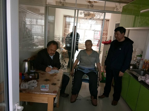 额市残联上门办证.jpg